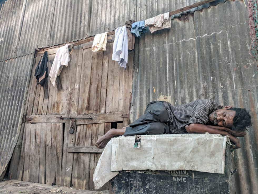guy sleeping on street